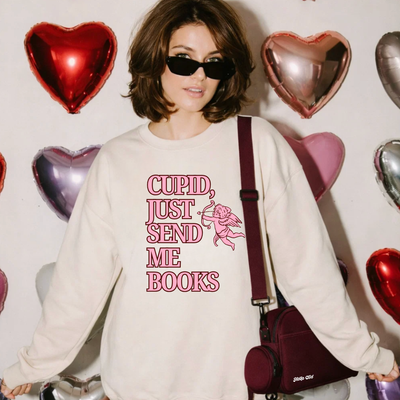 Cupid Just Send Me Books Sweatshirt | Pink Cupid Valentine Reading Tee